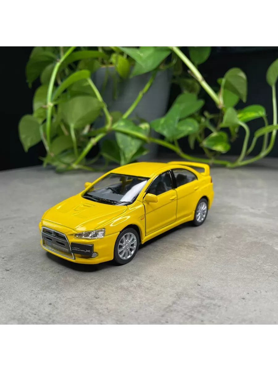 KINSMART Машинка игрушка Mitsubishi Lancer Evolution Х